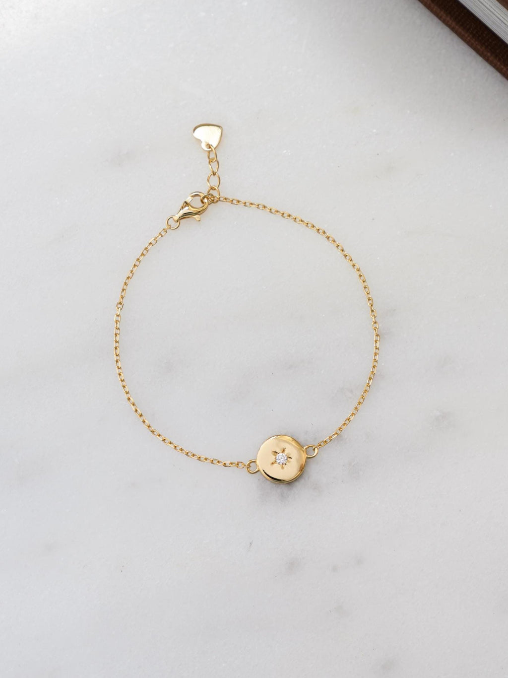 Round Starburst Charm Bracelet by Sami Jewels, Star Bracelet featuring a Minimalist and Adjustable Design
